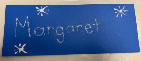 Name written in glue & covered in glitter