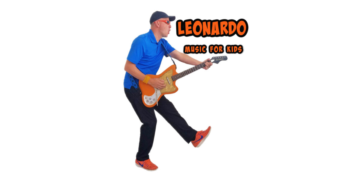 An image of Leonardo wearing sunglasses and playing an orange guitar