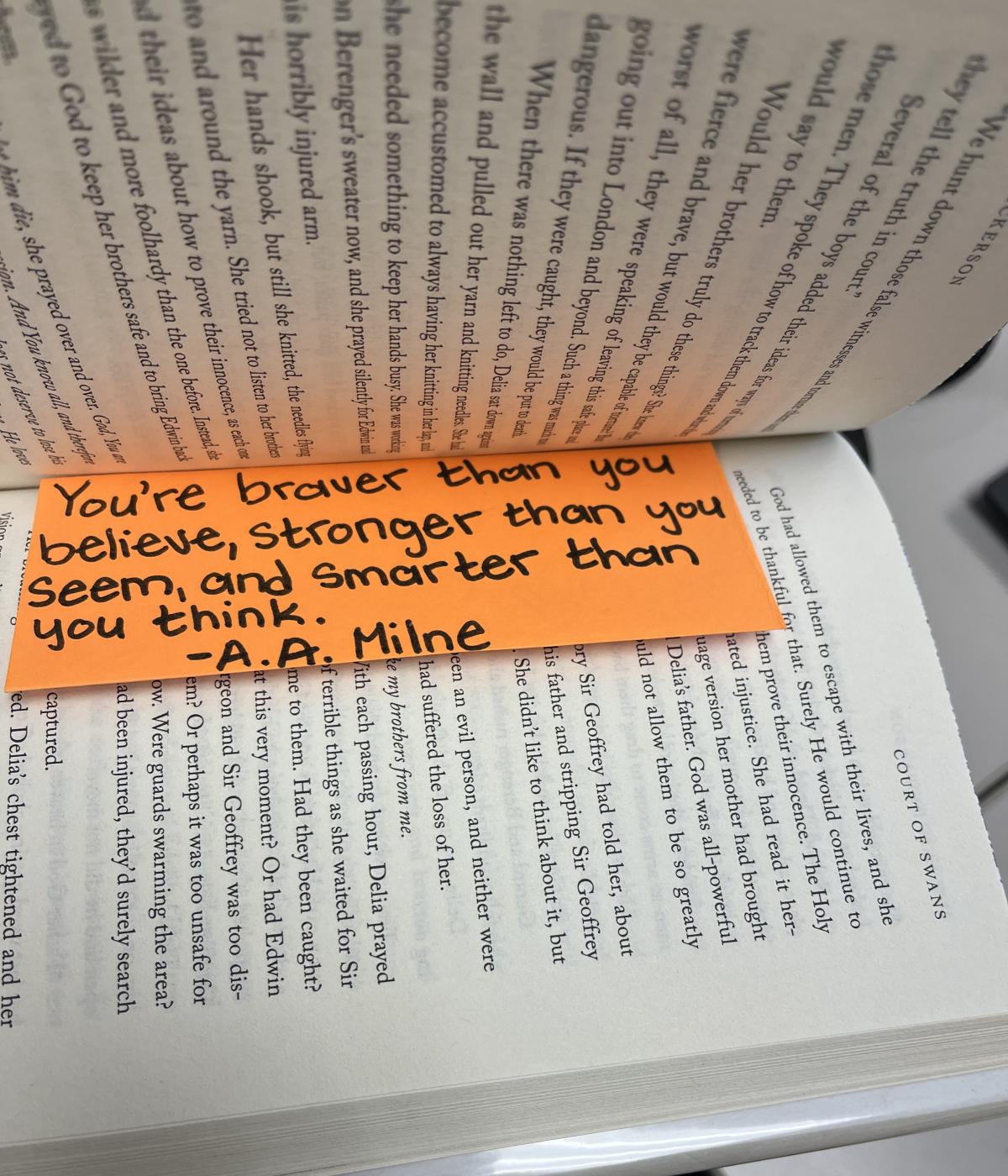 A.A. Milne quote on a note inside of a book