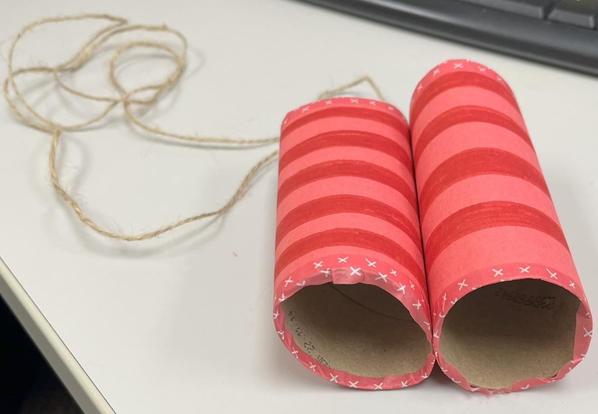 Cardboard tubes covered in construction paper and stapled together